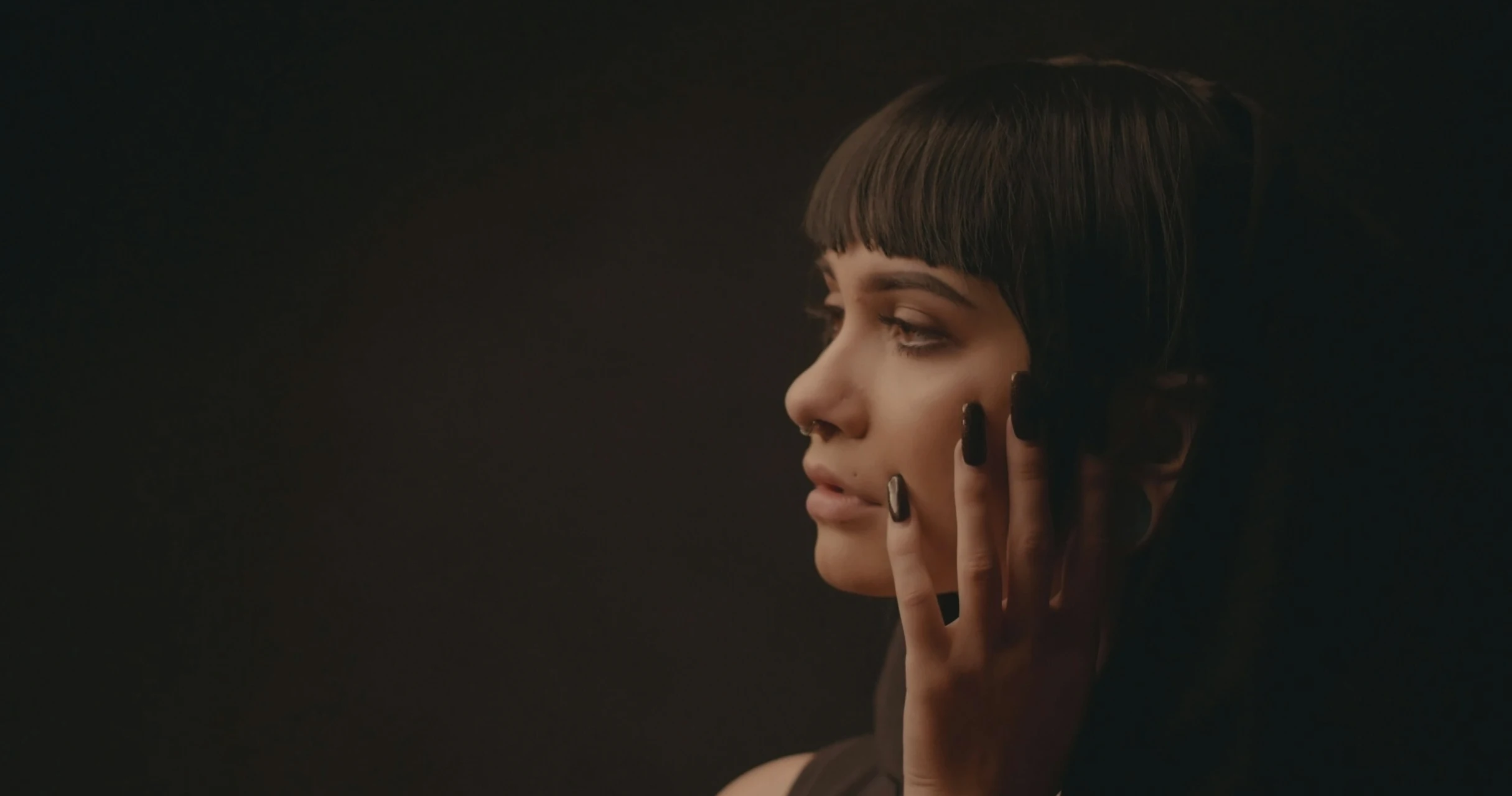 Woman showing finger nails