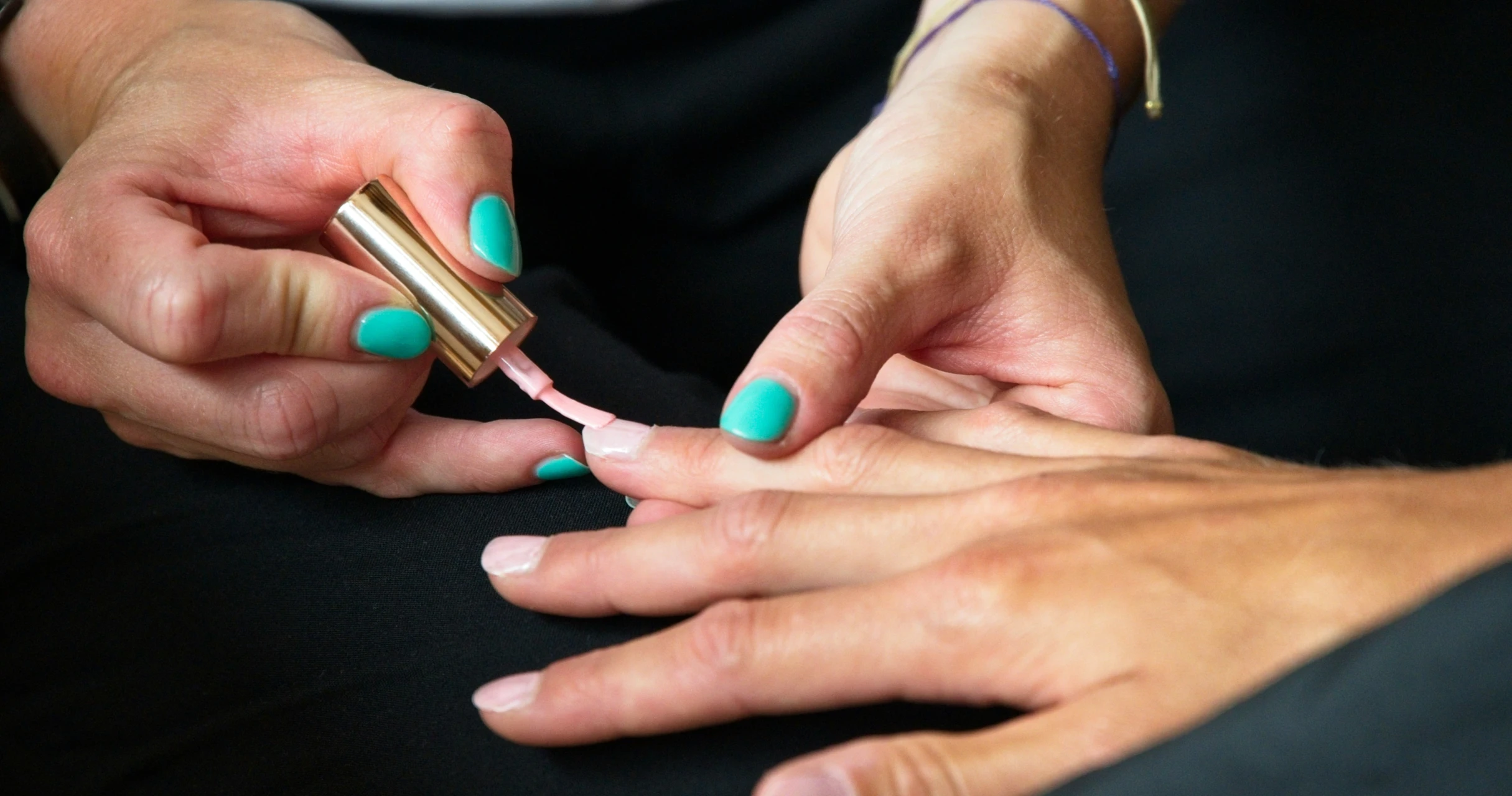 Finger nails being painted